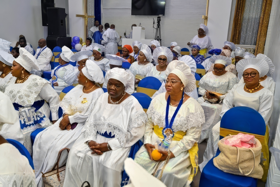 Members of SBJ Luli Cathedral gathered together in white and blue ceremonial garments.